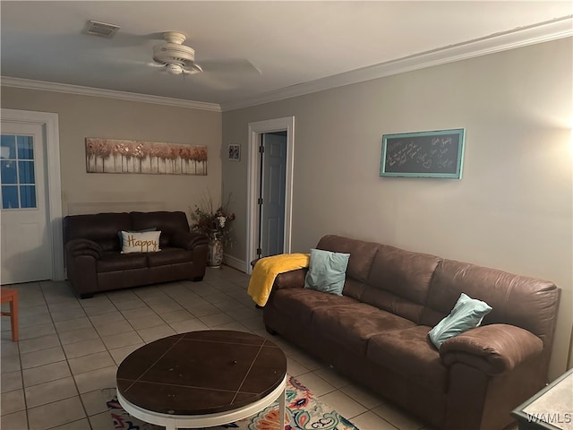 living room featuring ceiling fan, light tile patterned floors, and crown molding