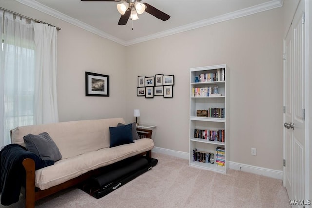 13982 Knoll Pointe Dr, Northport, AL 35475 - living area featuring a ceiling fan, ornamental molding, baseboards, and carpet flooring