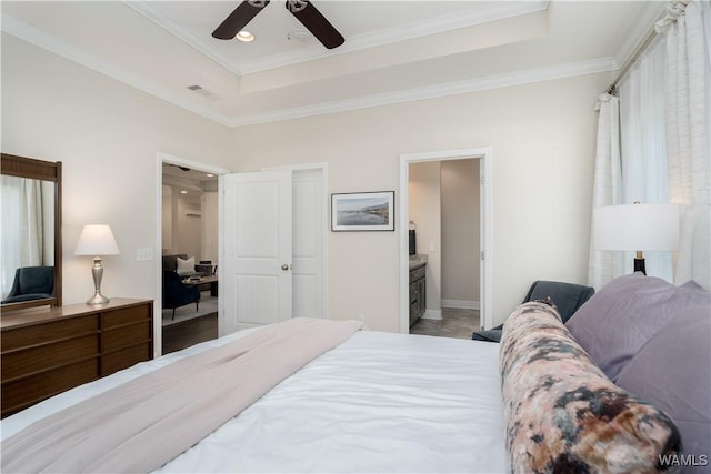 13982 Knoll Pointe Dr, Northport, AL 35475 - bedroom featuring ornamental molding, a raised ceiling, ensuite bathroom, an office area, and recessed lighting