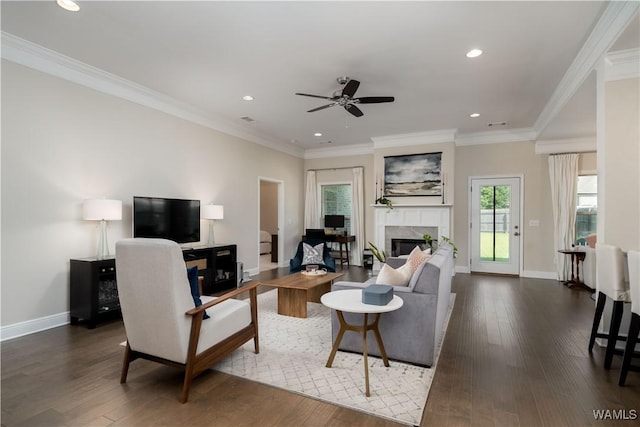 13982 Knoll Pointe Dr, Northport, AL 35475 - living room with ceiling fan, a premium fireplace, dark wood-style floors, recessed lighting, and crown molding