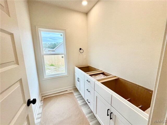 spare room with wood-type flooring