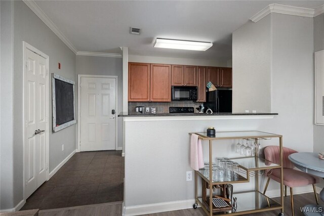 600 13th St E Unit 735, Tuscaloosa, AL 35401 - kitchen featuring black appliances, backsplash, dark countertops, brown cabinets, and ornamental molding