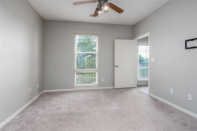 600 13th St E Unit 735, Tuscaloosa, AL 35401 - spare room with a ceiling fan, carpet flooring, and baseboards