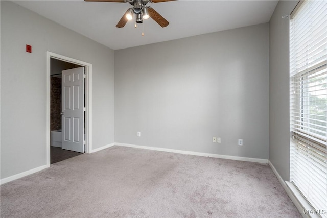 600 13th St E Unit 735, Tuscaloosa, AL 35401 - spare room featuring carpet flooring, ceiling fan, and baseboards