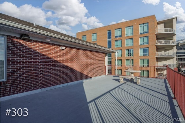 view of home's exterior featuring a balcony