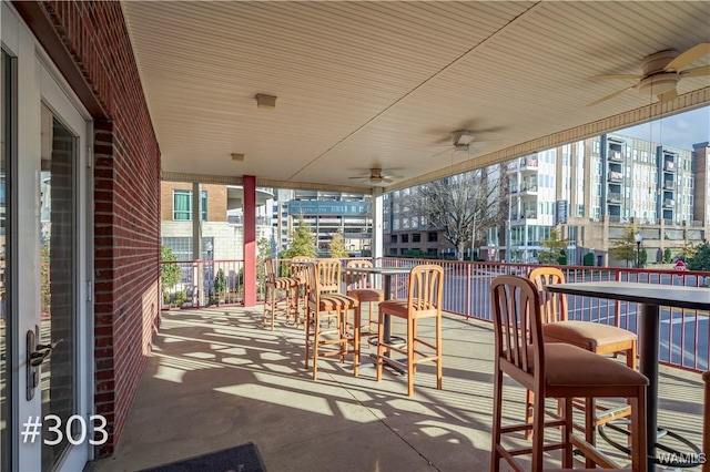 view of patio / terrace featuring ceiling fan