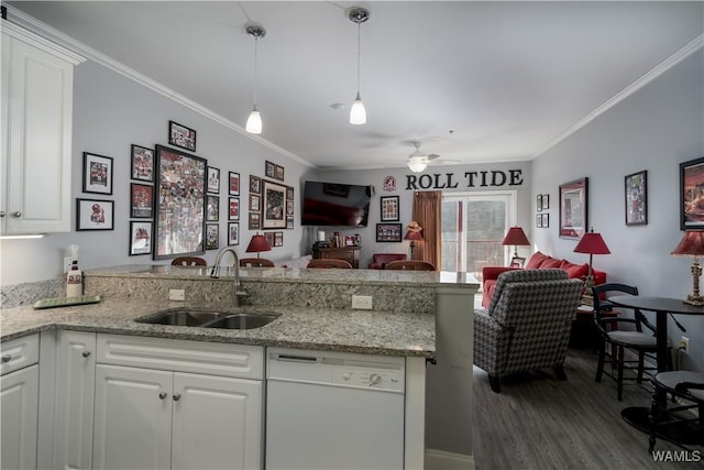 kitchen featuring ceiling fan, dishwasher, white cabinets, and sink