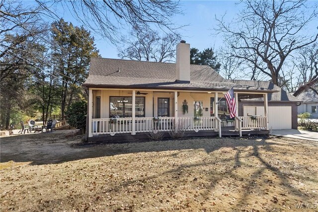 view of front of house with a porch and a garage