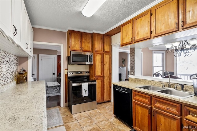 kitchen featuring sink, tasteful backsplash, a textured ceiling, ornamental molding, and stainless steel appliances