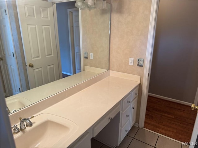 bathroom featuring tile patterned floors and vanity