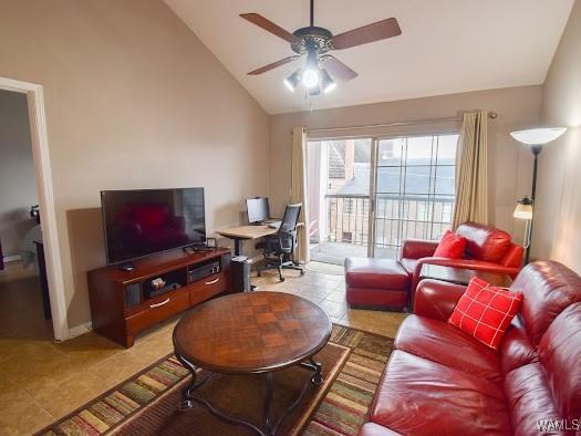 tiled living room with ceiling fan and vaulted ceiling