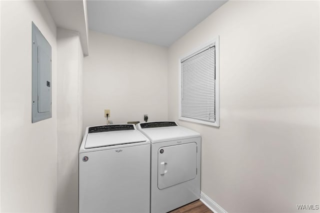 12515 Bone Camp Rd, Northport, AL 35475 - laundry room with separate washer and dryer, electric panel, baseboards, and wood finished floors