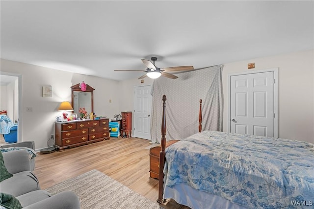 12515 Bone Camp Rd, Northport, AL 35475 - bedroom with light wood-style floors and ceiling fan