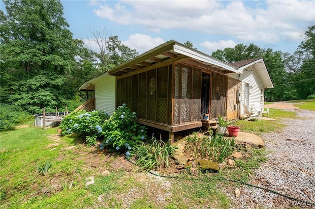 12515 Bone Camp Rd, Northport, AL 35475 - view of side of property featuring a sunroom