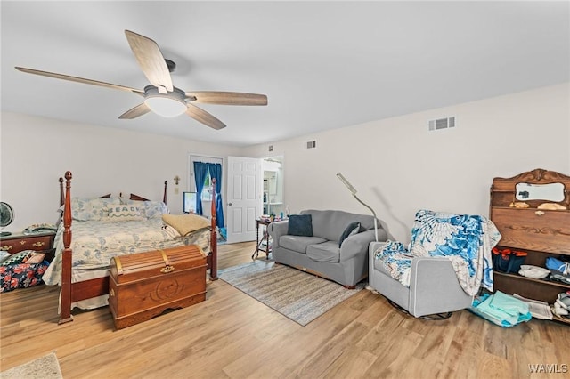 12515 Bone Camp Rd, Northport, AL 35475 - bedroom with wood finished floors and a ceiling fan