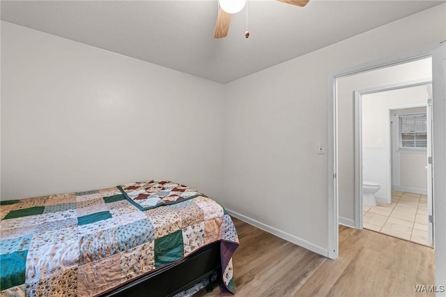 12515 Bone Camp Rd, Northport, AL 35475 - bedroom featuring light wood-style flooring, baseboards, and ceiling fan