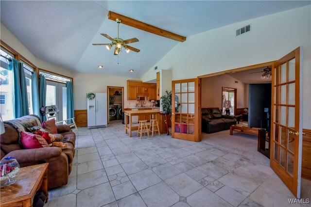 3541 Oak Bend Rd, Tuscaloosa, AL 35406 - living room featuring french doors, ceiling fan, and washer / clothes dryer