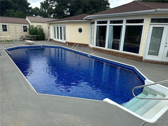 3541 Oak Bend Rd, Tuscaloosa, AL 35406 - swimming pool featuring french doors, a patio area, and an outdoor structure