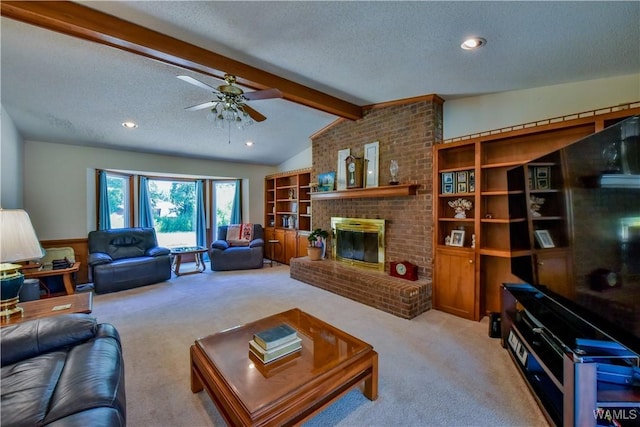 3541 Oak Bend Rd, Tuscaloosa, AL 35406 - living area with carpet floors, a textured ceiling, a ceiling fan, a fireplace, and recessed lighting
