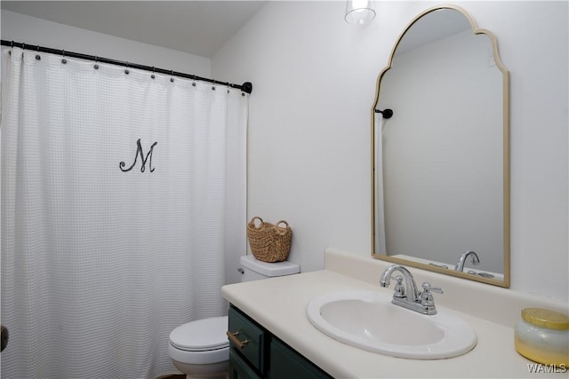 full bathroom with toilet, vanity, and a shower with curtain