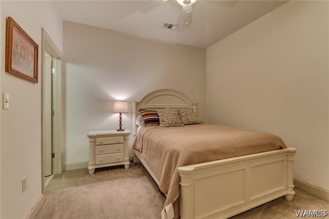 bedroom featuring ceiling fan and light colored carpet