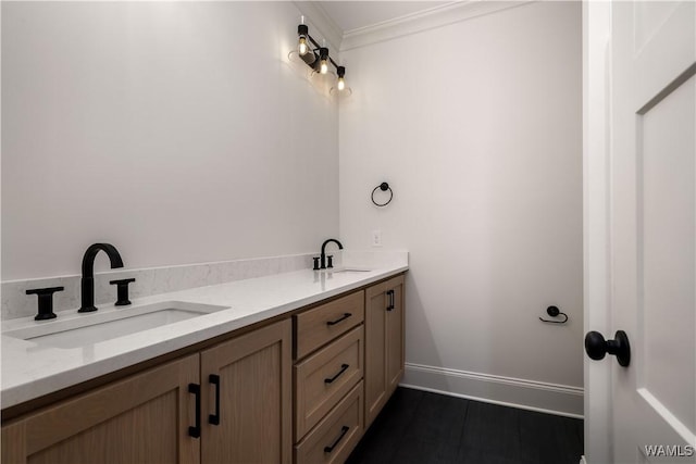 bathroom featuring vanity and ornamental molding