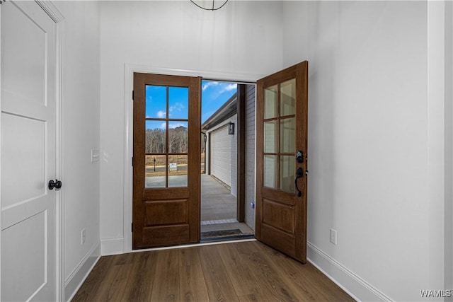 doorway featuring hardwood / wood-style flooring