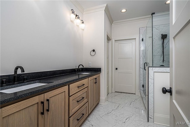 bathroom featuring ornamental molding, vanity, and a shower with door