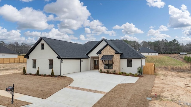 view of front of property featuring a garage