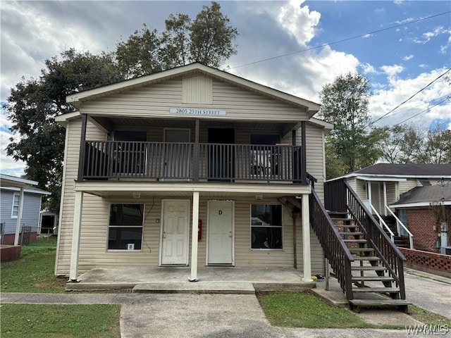 2805 25th St, Tuscaloosa, AL 35401 - multi unit property with a balcony, a porch, and stairway