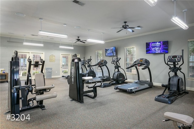 gym with crown molding, baseboards, visible vents, and ceiling fan