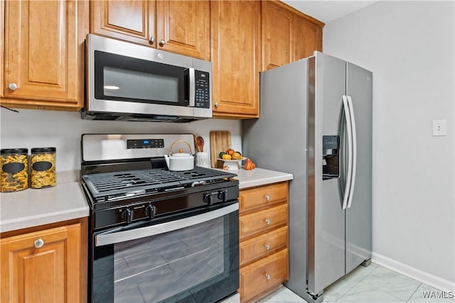 kitchen with appliances with stainless steel finishes