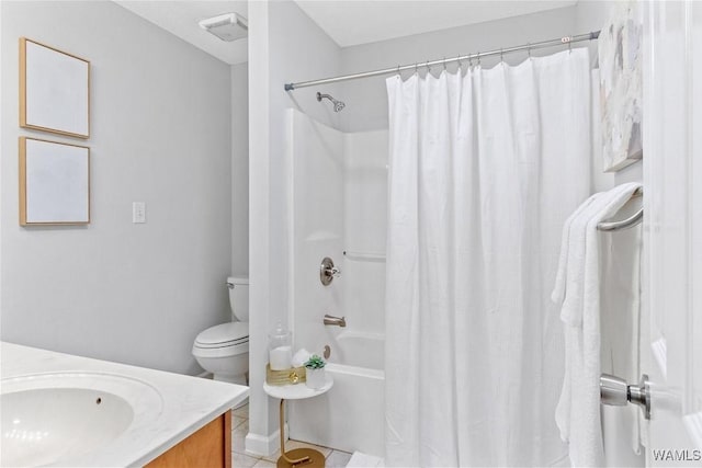 full bathroom with shower / tub combo with curtain, vanity, toilet, and tile patterned floors