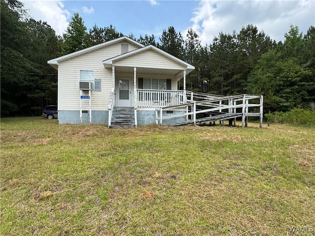 19434 Dan Shelby Rd, Northport, AL 35475 - view of front of home with a porch, a front yard, and crawl space