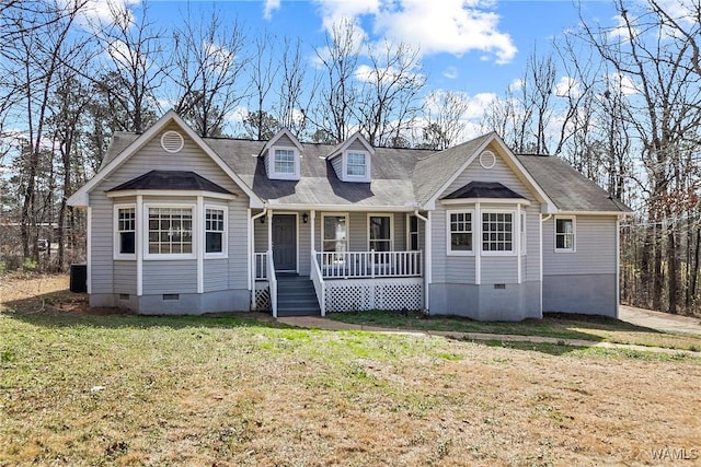 view of front of property with a front yard, crawl space, covered porch, and central air condition unit