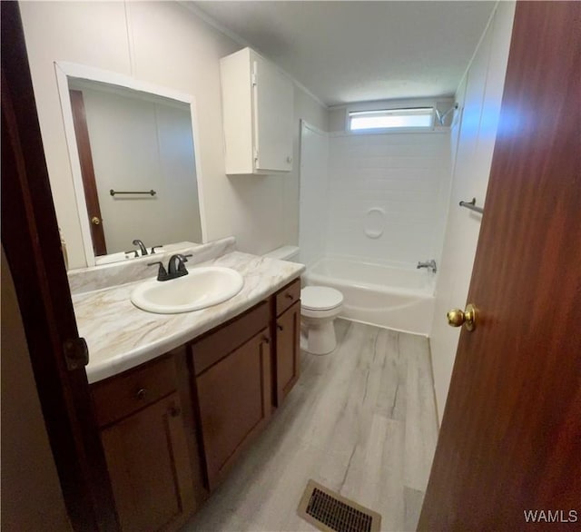 4247 W Ashby Rd, Brierfield, AL 35035 - full bathroom with vanity, wood finished floors, and shower / bathtub combination