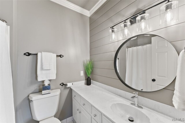 20892 Sharon Dr, Lake View, AL 35111 - full bathroom with crown molding, toilet, vanity, and wood walls