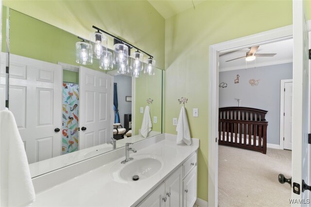 20892 Sharon Dr, Lake View, AL 35111 - bathroom with vanity, ceiling fan, baseboards, and crown molding