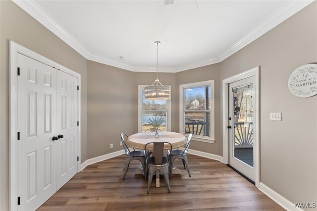 20892 Sharon Dr, Lake View, AL 35111 - dining room featuring an inviting chandelier, crown molding, baseboards, and wood finished floors