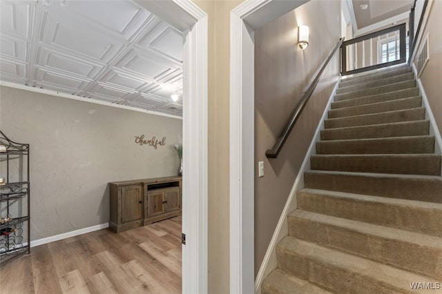 20892 Sharon Dr, Lake View, AL 35111 - staircase featuring baseboards, wood finished floors, and an ornate ceiling