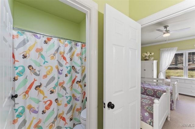 20892 Sharon Dr, Lake View, AL 35111 - bathroom with a shower with curtain, toilet, crown molding, and ceiling fan