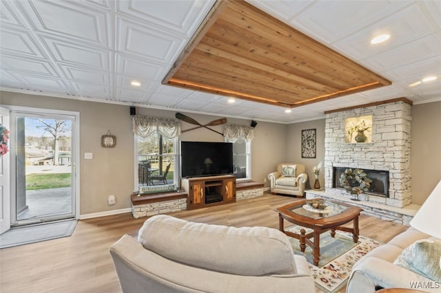 20892 Sharon Dr, Lake View, AL 35111 - living room featuring baseboards, a fireplace, wood finished floors, and recessed lighting