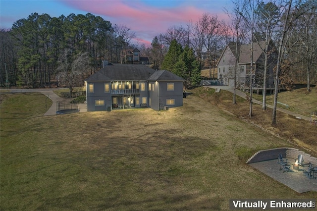 20892 Sharon Dr, Lake View, AL 35111 - back of property at dusk featuring a lawn