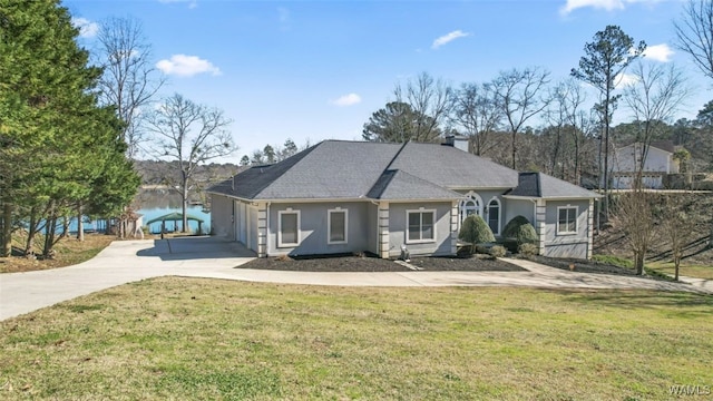 20892 Sharon Dr, Lake View, AL 35111 - view of front facade with a chimney, a front lawn, and concrete driveway