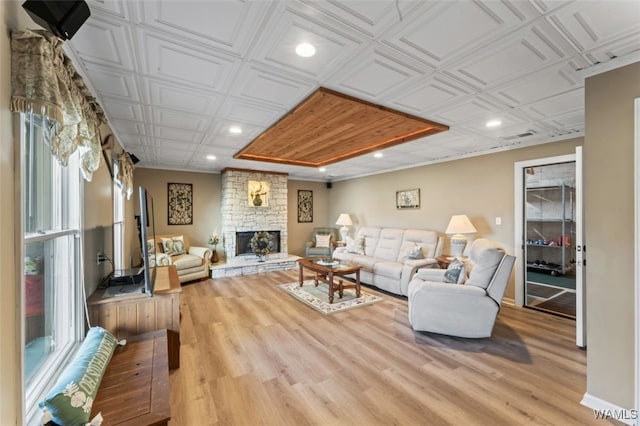 20892 Sharon Dr, Lake View, AL 35111 - living area with recessed lighting, an ornate ceiling, baseboards, a stone fireplace, and wood finished floors
