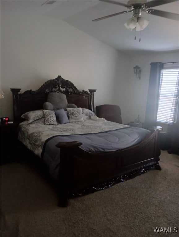 bedroom featuring carpet and a ceiling fan