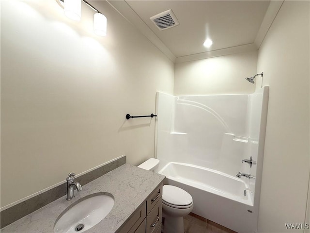 full bathroom featuring toilet, visible vents, crown molding, vanity, and tub / shower combination