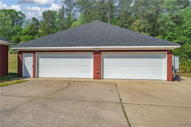 garage with driveway