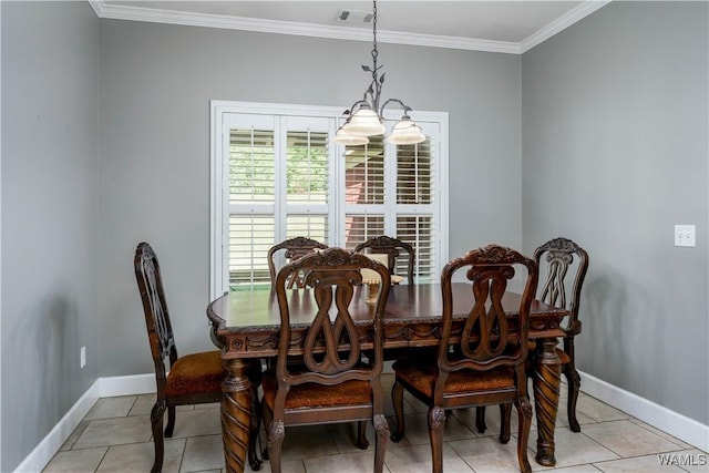 dining space with visible vents, baseboards, light tile patterned floors, and crown molding