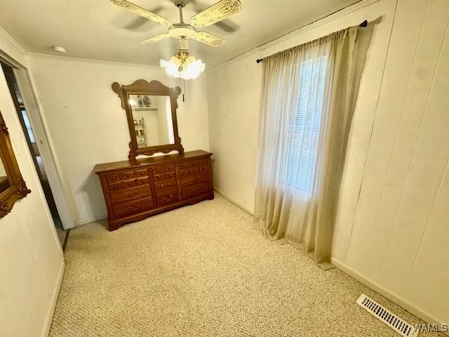 1511 Service St, Demopolis, AL 36732 - bedroom with carpet floors, crown molding, ceiling fan, and baseboards